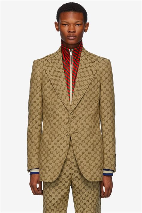 gucci logo suit|Gucci suit meaning.